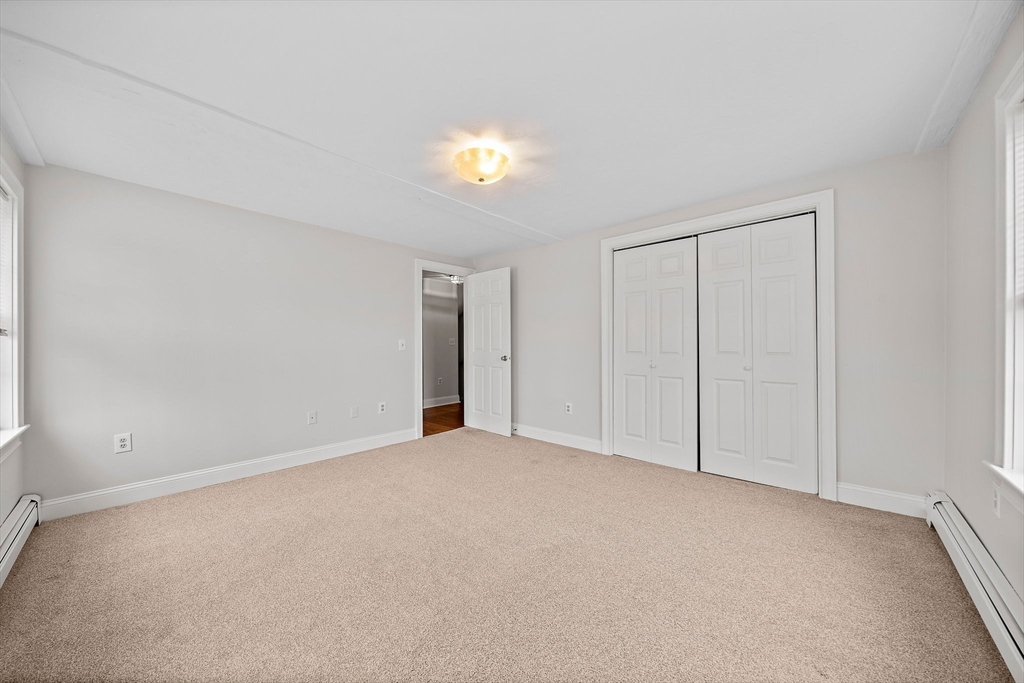 238 Neponset Street, Unit 2 Canton, MA 02021 - Photo 12 of 22 a view of an empty room and a window