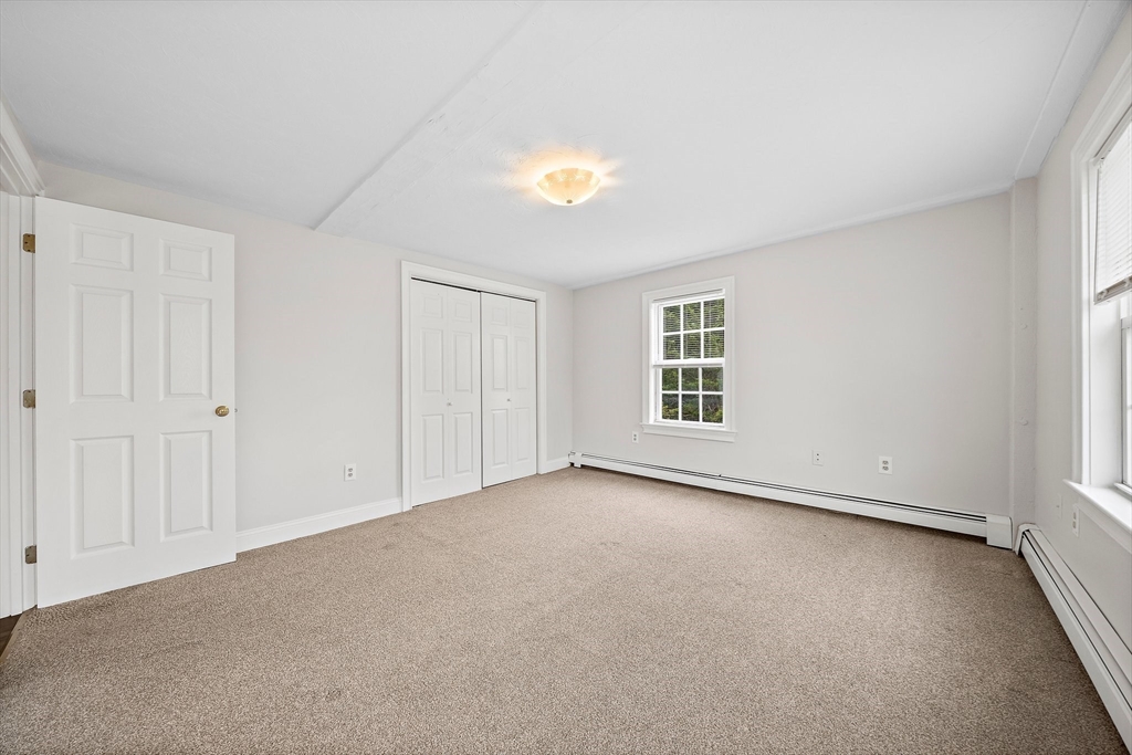 238 Neponset Street, Unit 2 Canton, MA 02021 - Photo 13 of 22 a view of an empty room with a window