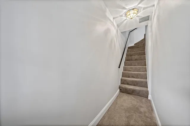 a view of a balcony with wooden floor
