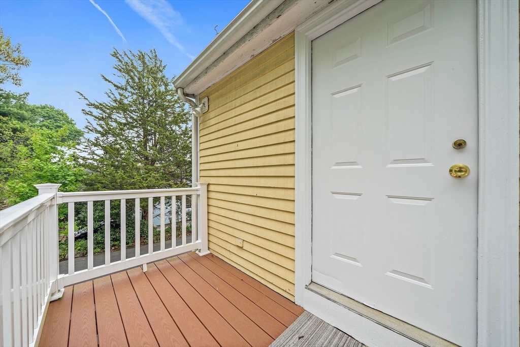 238 Neponset Street, Unit 2 Canton, MA 02021 - Photo 20 of 22 a view of a balcony with wooden floor
