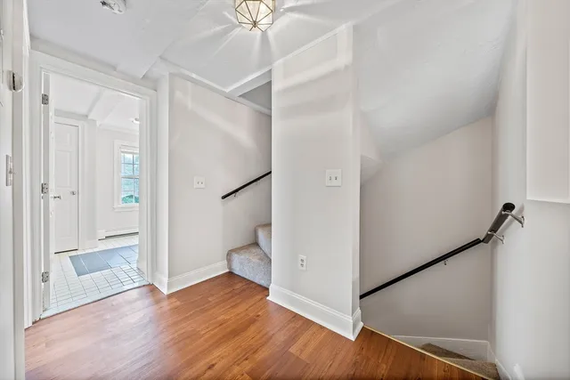 a view of bathroom with a shower and a toilet