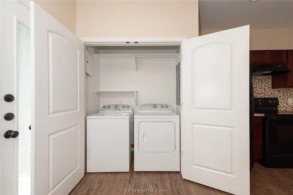 a utility room with dryer and washer