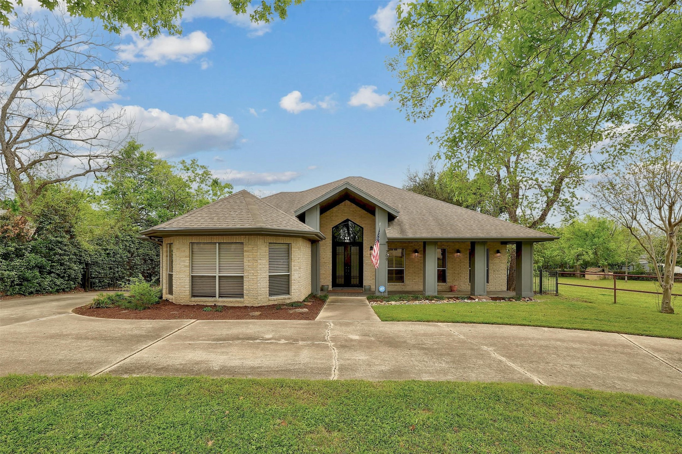 709 Old McDade Road Elgin, TX 78621 - Photo 1 of 1 Sitting on a spacious 0.979 acre lot this enchanting brick exterior residence boasts a picturesque drive-through driveway.