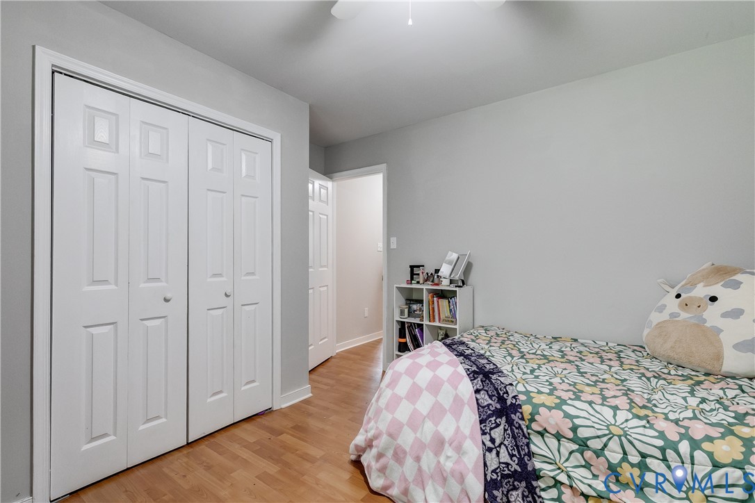 1030 Rock Spring Road Bumpass, VA 23024 - Photo 22 of 34 a bedroom with a bed and a closet
