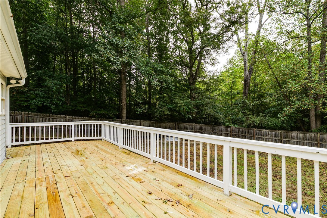 1030 Rock Spring Road Bumpass, VA 23024 - Photo 29 of 34 a view of balcony with wooden floor and fence