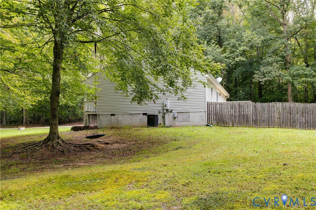 1030 Rock Spring Road Bumpass, VA 23024 - Photo 33 of 34 a house view with swimming pool in front
