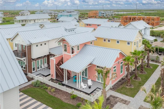 an aerial view of a house with balcony