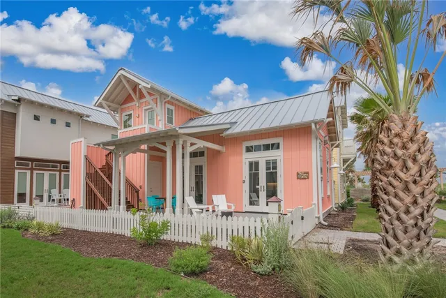 front view of a house with a garden