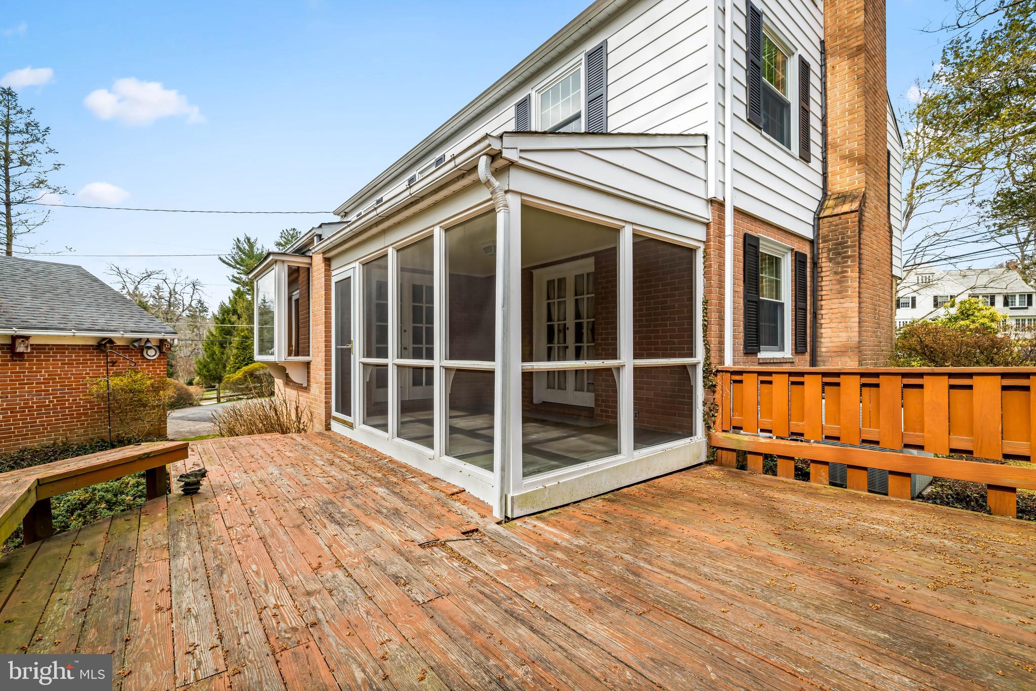 1607 Ruxton Road Towson, MD 21204 - Photo 23 of 46 a view of a balcony with wooden floor and fence