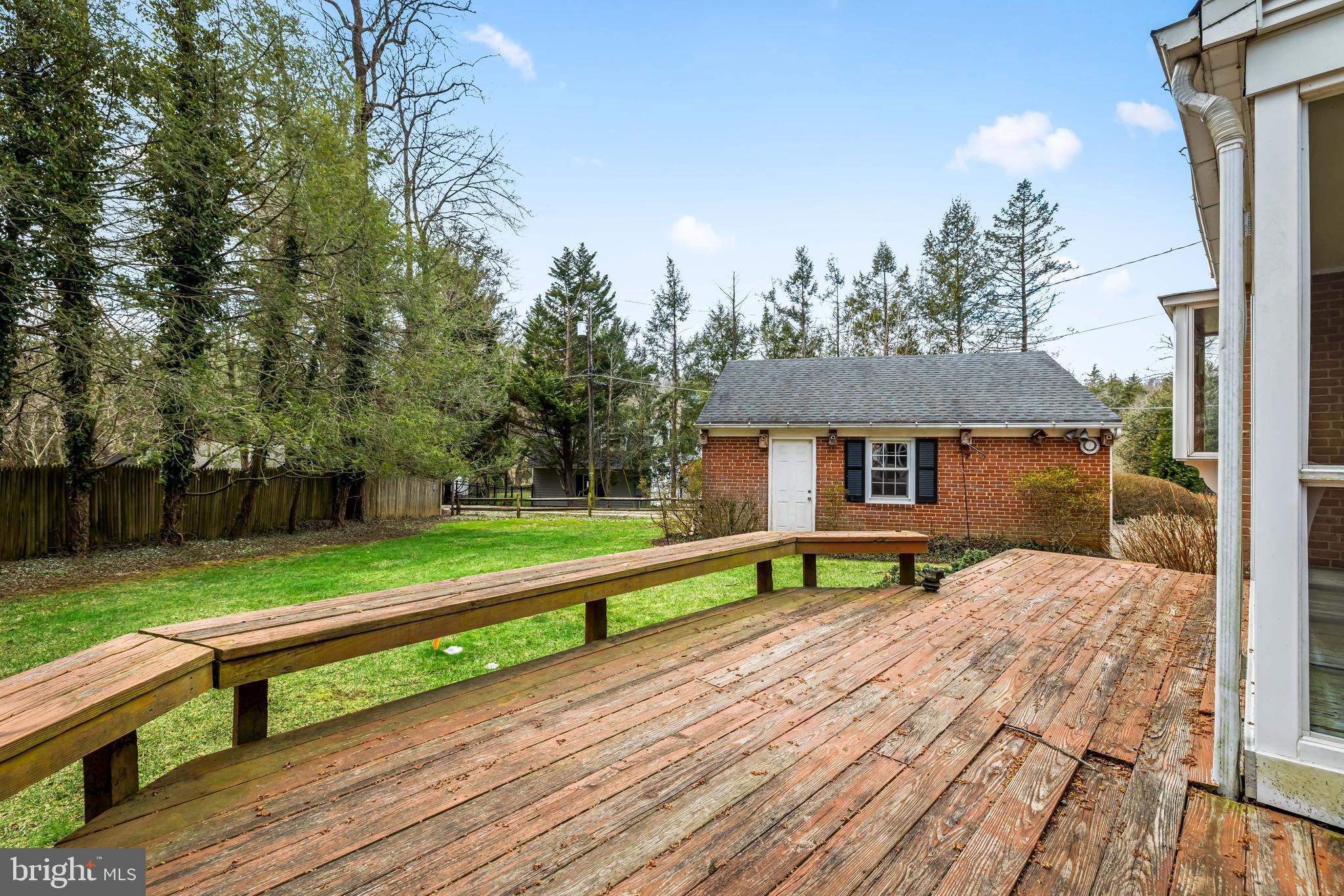 1607 Ruxton Road Towson, MD 21204 - Photo 25 of 46 a view of a deck and a yard with wooden fence