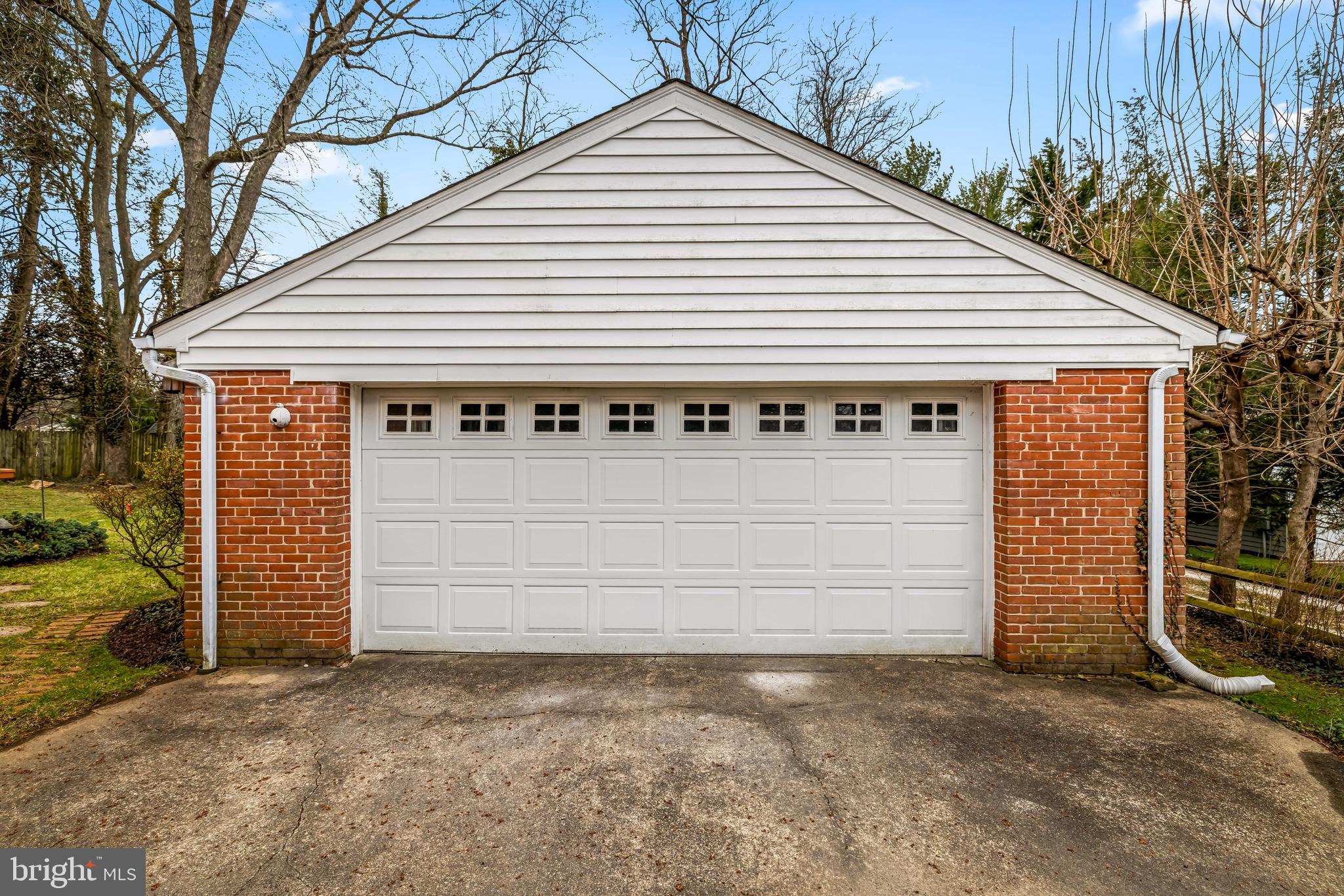 1607 Ruxton Road Towson, MD 21204 - Photo 28 of 46 a view of a white house with large space next to a yard
