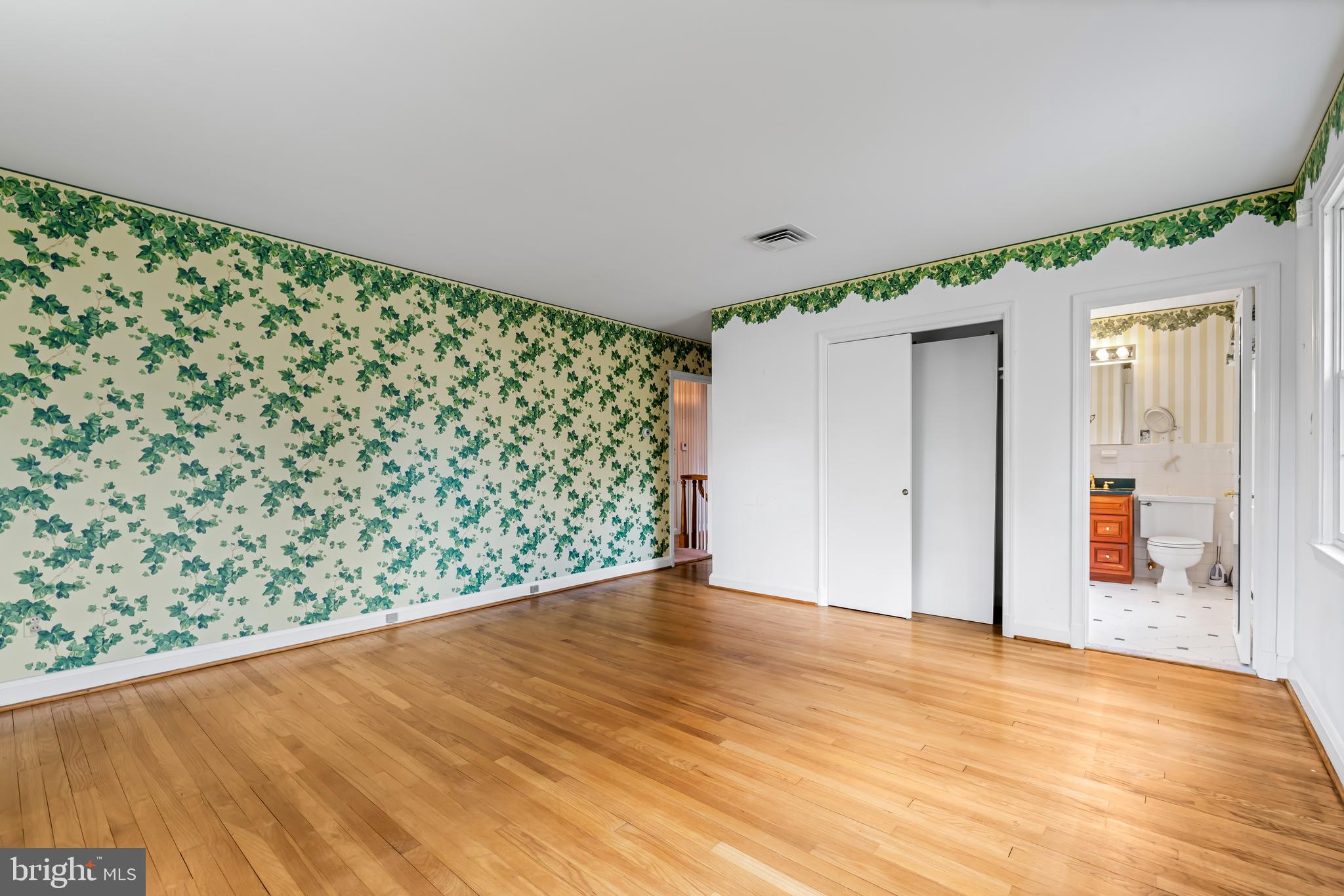 1607 Ruxton Road Towson, MD 21204 - Photo 31 of 46 a view of empty room with wooden floor