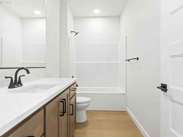 a living room with a fireplace and a window