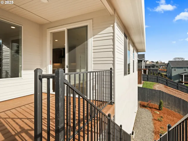 a view of a backyard of the house