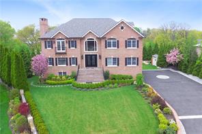 15 Rutland Road Bronxville, NY 10708 - Photo 1 of 1 a front view of a house with garden