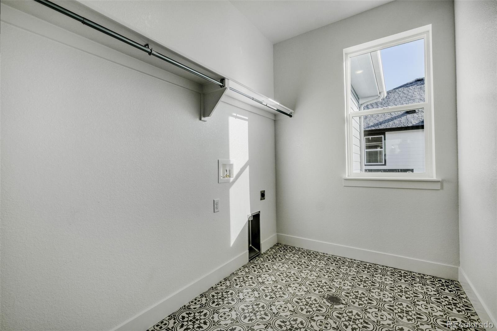 9659 Owl Perch Loop Colorado Springs, CO 80908 - Photo 16 of 28 a view of a closet area with wooden floor