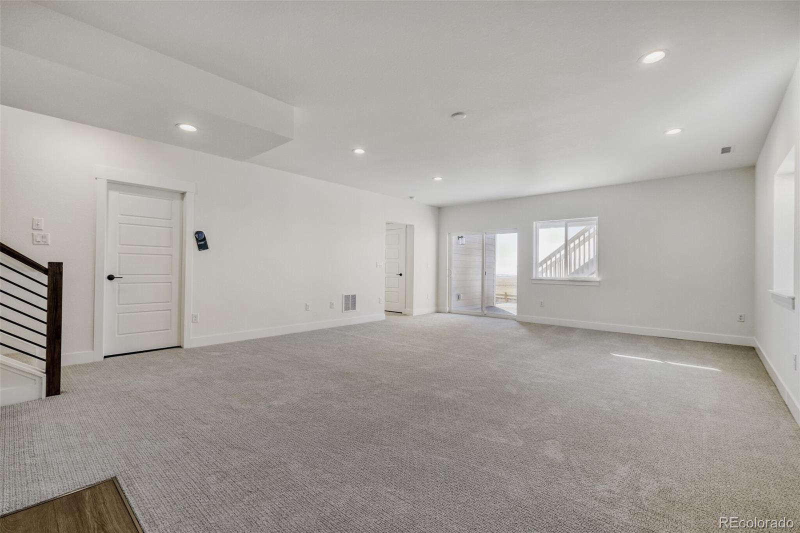 9659 Owl Perch Loop Colorado Springs, CO 80908 - Photo 5 of 28 a view of an empty room with a window