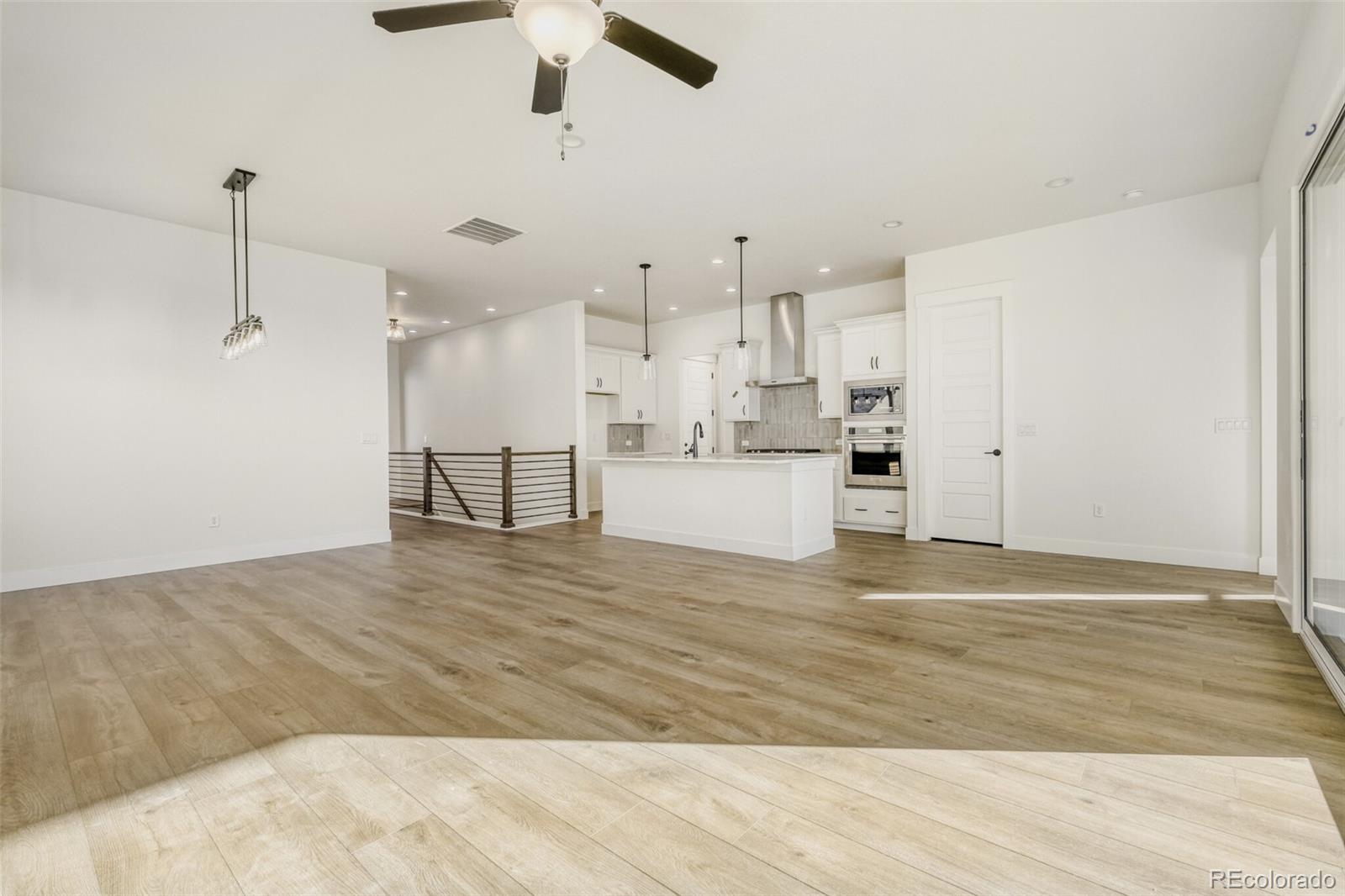 9659 Owl Perch Loop Colorado Springs, CO 80908 - Photo 7 of 28 a view of a kitchen with kitchen appliances and cabinets