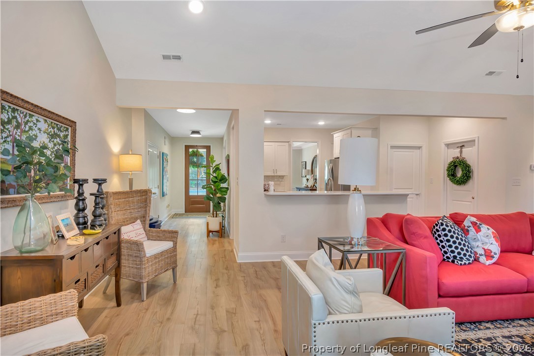 570 Old Tower Road Lumberton, NC 28360 - Photo 12 of 32 a living room with furniture kitchen view and a large window