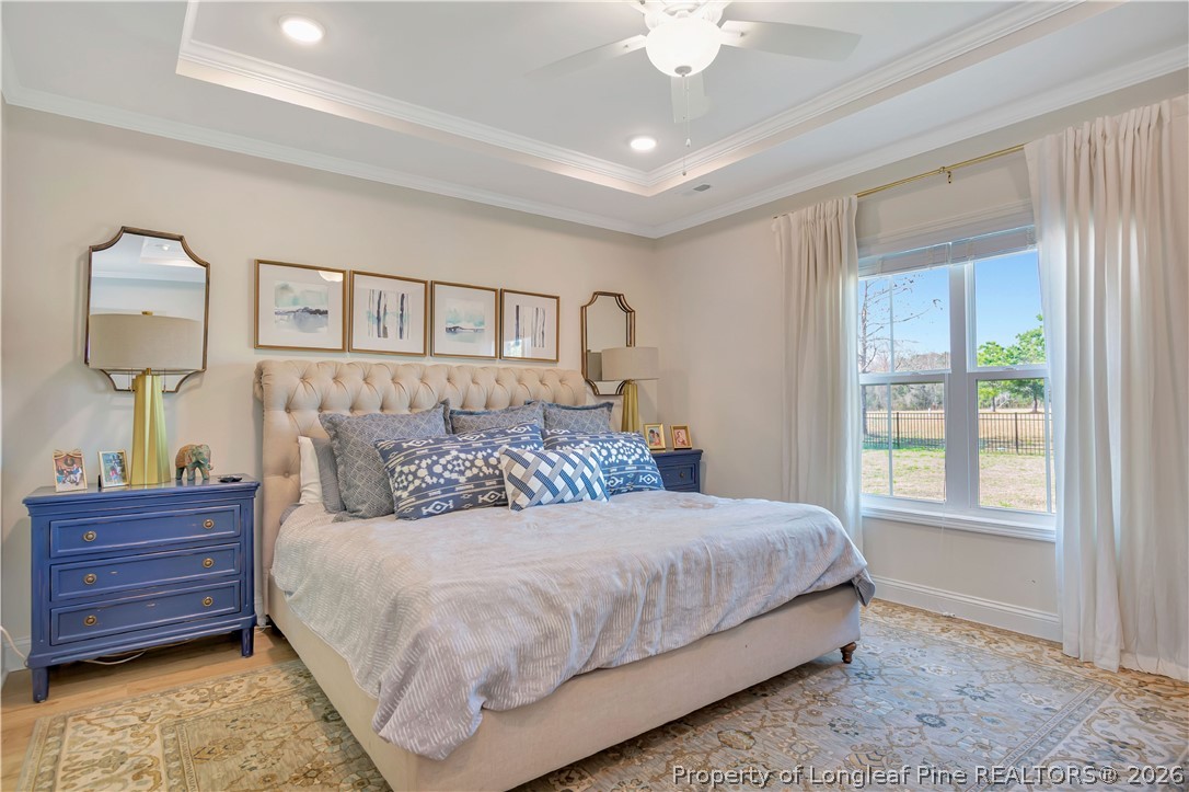 570 Old Tower Road Lumberton, NC 28360 - Photo 17 of 32 a bedroom with a large bed and a window