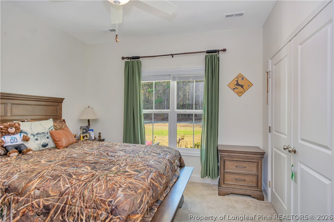 570 Old Tower Road Lumberton, NC 28360 - Photo 27 of 32 a bedroom with a bed and a window