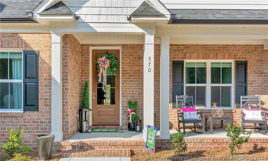 570 Old Tower Road Lumberton, NC 28360 - Photo 4 of 32 a front view of a house with a yard