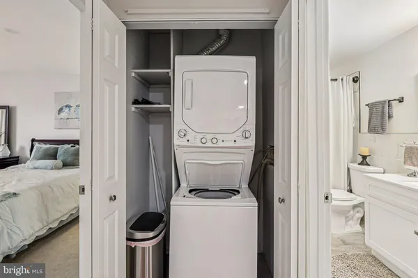 a en suite bathroom with a toilet and a tub