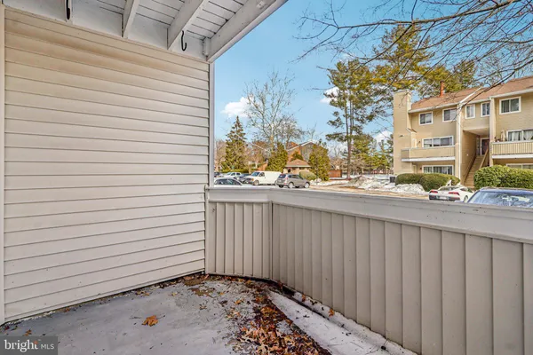 a view of a balcony with a tree