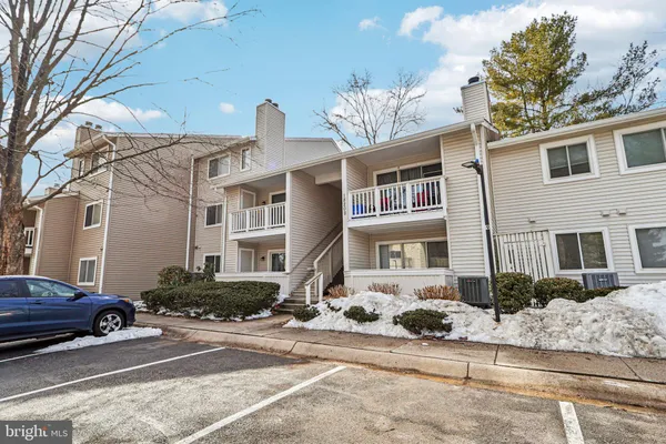 a view of a car park in front of a building