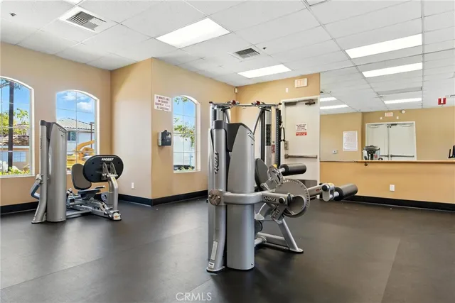 a view of a park with swings and slides