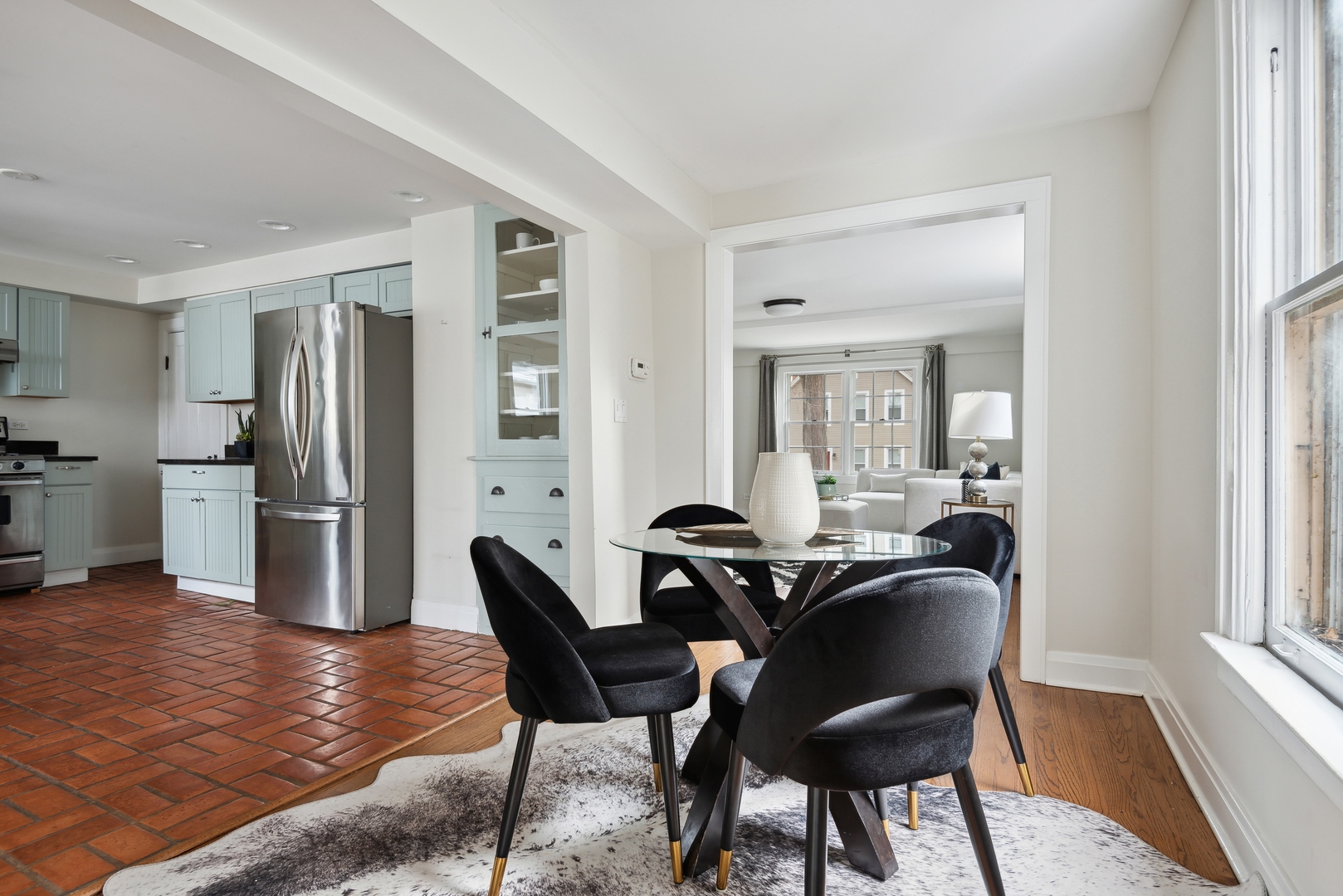 2120 Wesley Avenue Evanston, IL 60201 - Photo 11 of 32 a view of a dining room with furniture and a window