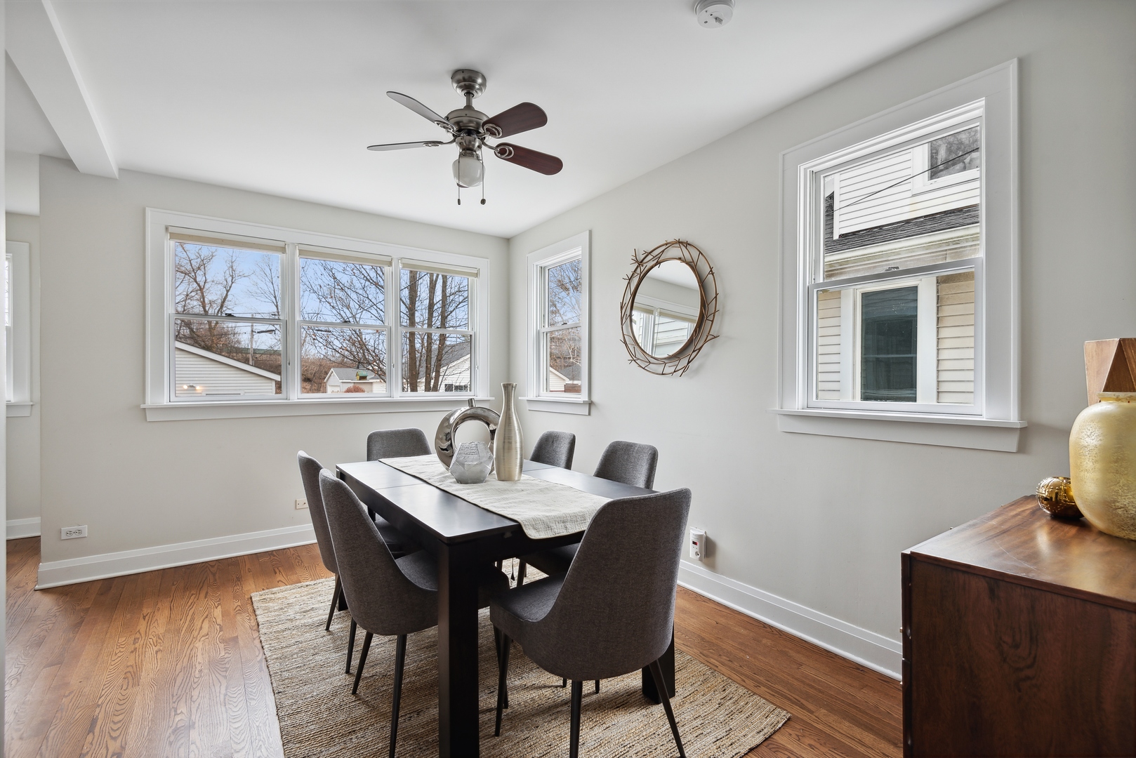 2120 Wesley Avenue Evanston, IL 60201 - Photo 15 of 32 a view of a dining room with furniture window and wooden floor