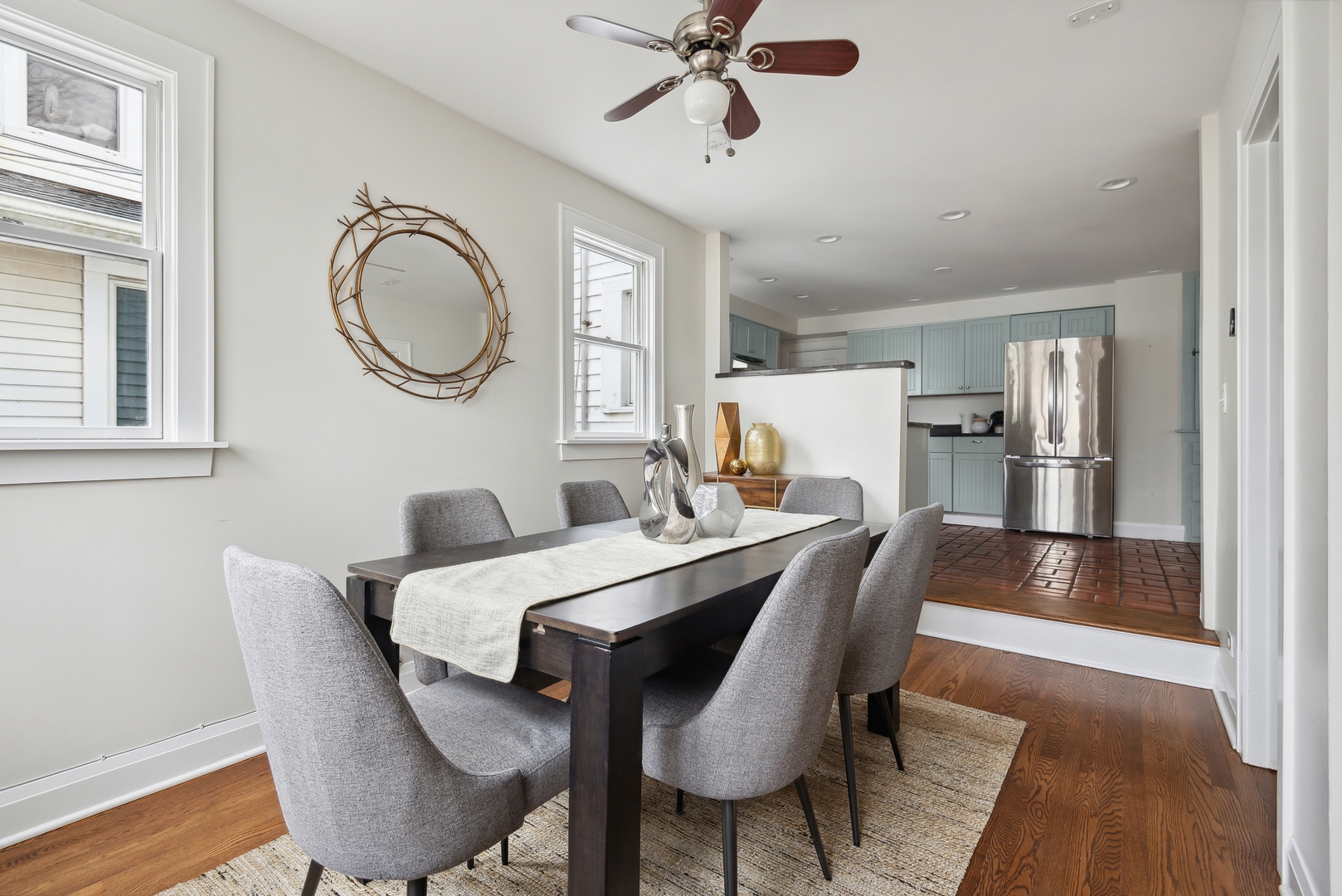 2120 Wesley Avenue Evanston, IL 60201 - Photo 16 of 32 a dining room with furniture a window and wooden floor