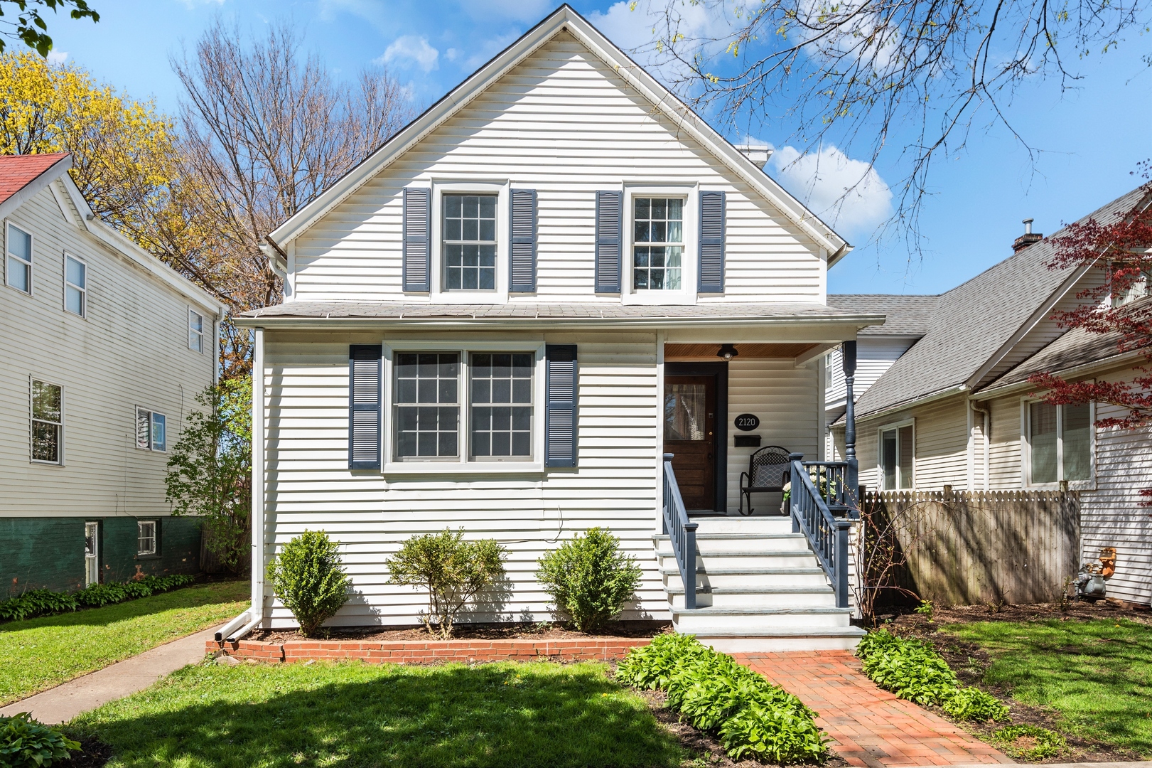 2120 Wesley Avenue Evanston, IL 60201 - Photo 2 of 32 a front view of a house with a yard
