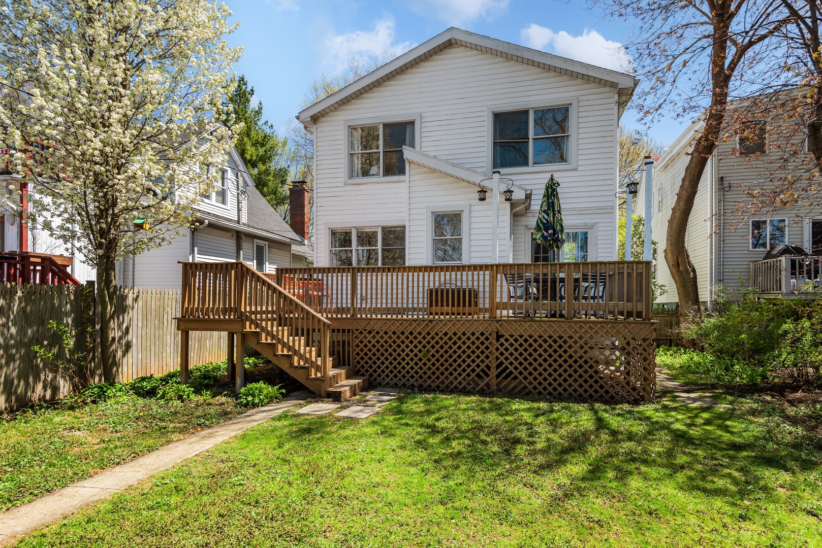 2120 Wesley Avenue Evanston, IL 60201 - Photo 26 of 32 a view of a house with wooden fence