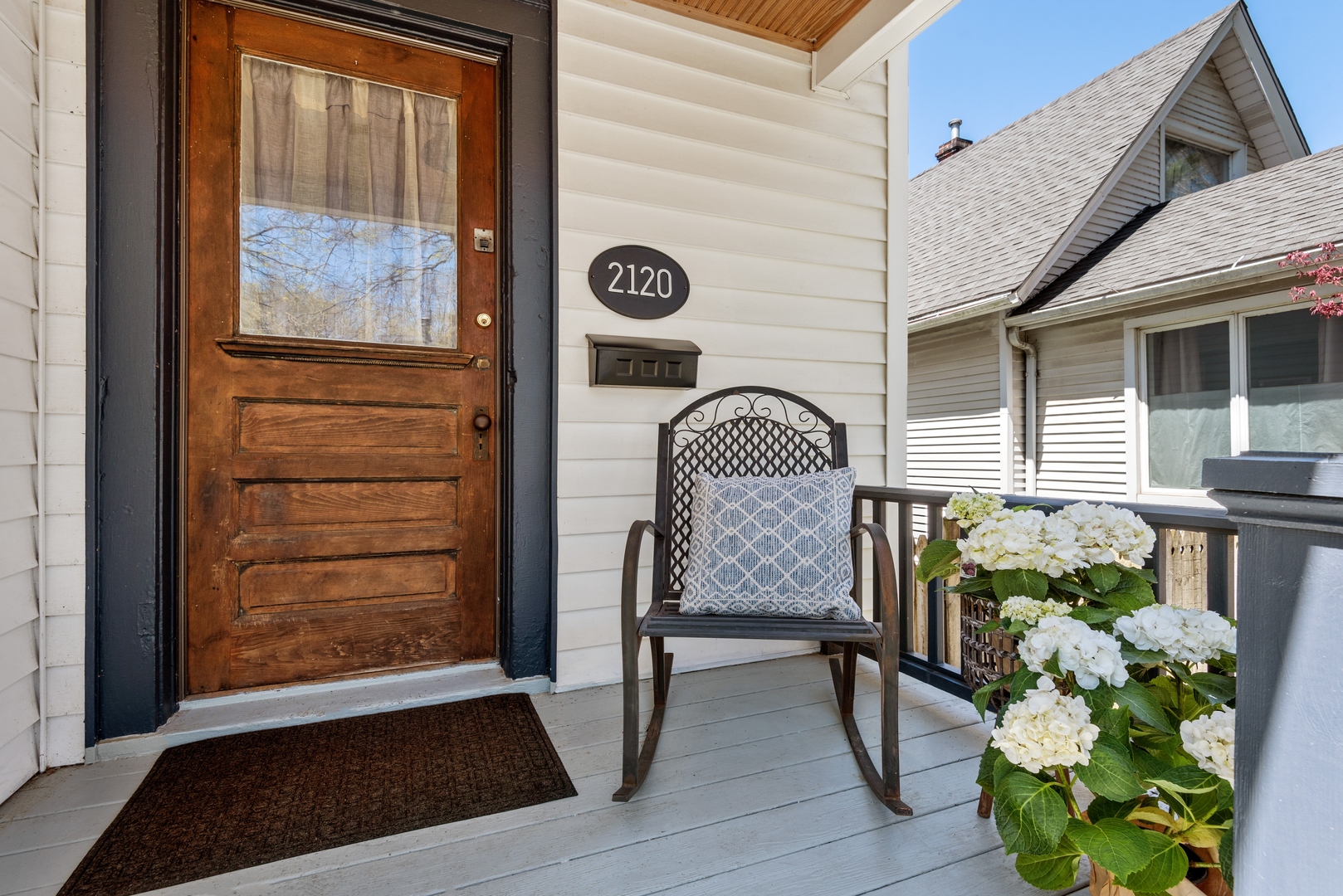 2120 Wesley Avenue Evanston, IL 60201 - Photo 3 of 32 a view of front door with chair and wooden floor