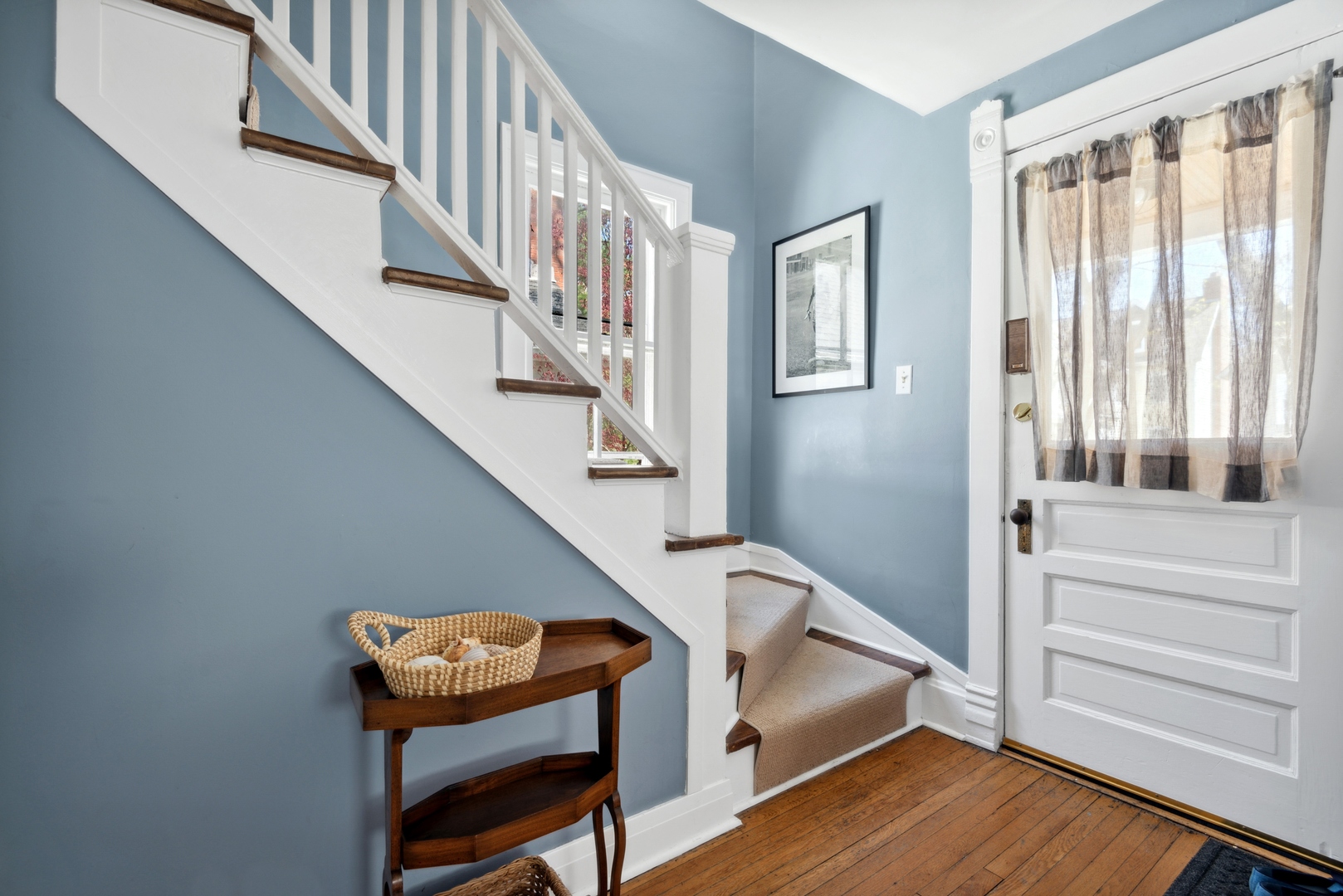 2120 Wesley Avenue Evanston, IL 60201 - Photo 4 of 32 a view of entryway and hall with wooden floor