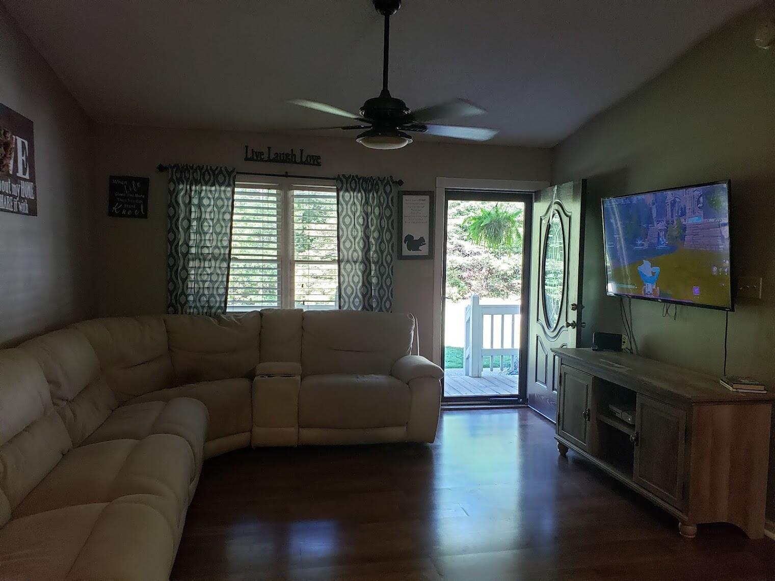 2040 Dugspur Road Callaway, VA 24067 - Photo 5 of 15 a living room with furniture and a flat screen tv