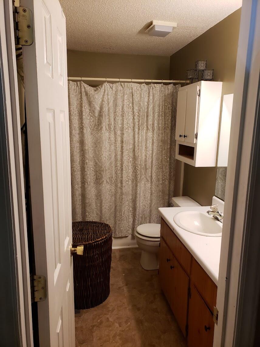 2040 Dugspur Road Callaway, VA 24067 - Photo 10 of 15 a bathroom with a sink a toilet and shower