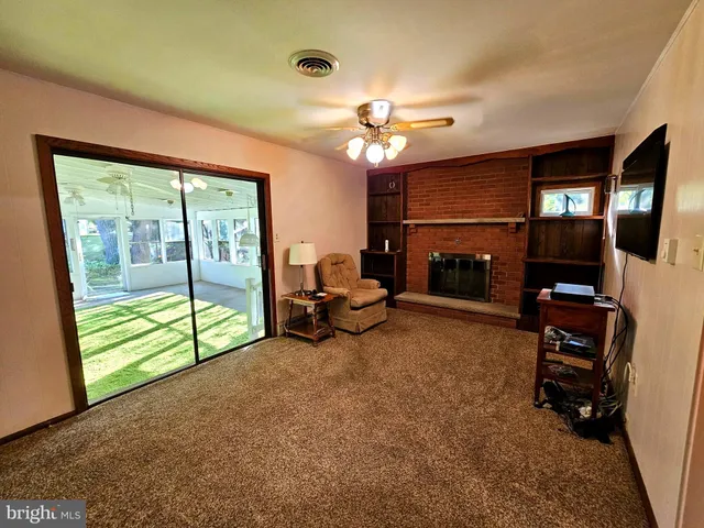 a view of pool and outdoor space
