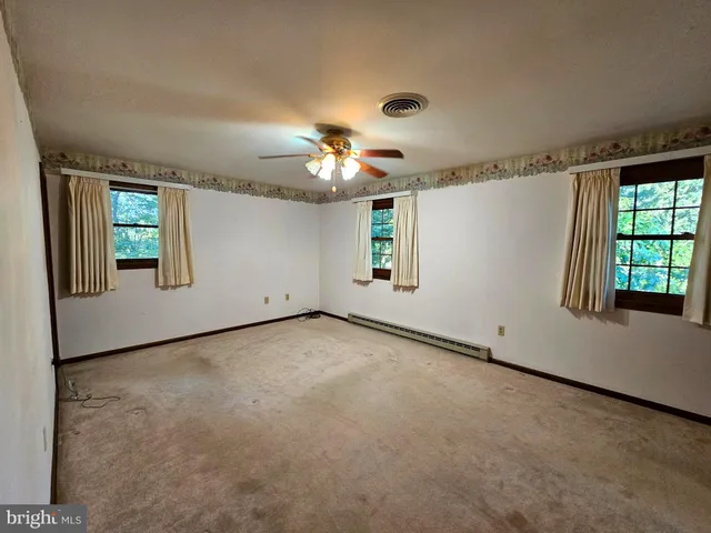 a view of a livingroom with a fireplace