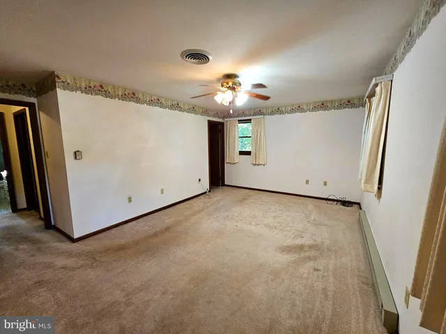 a view of a livingroom with a fireplace