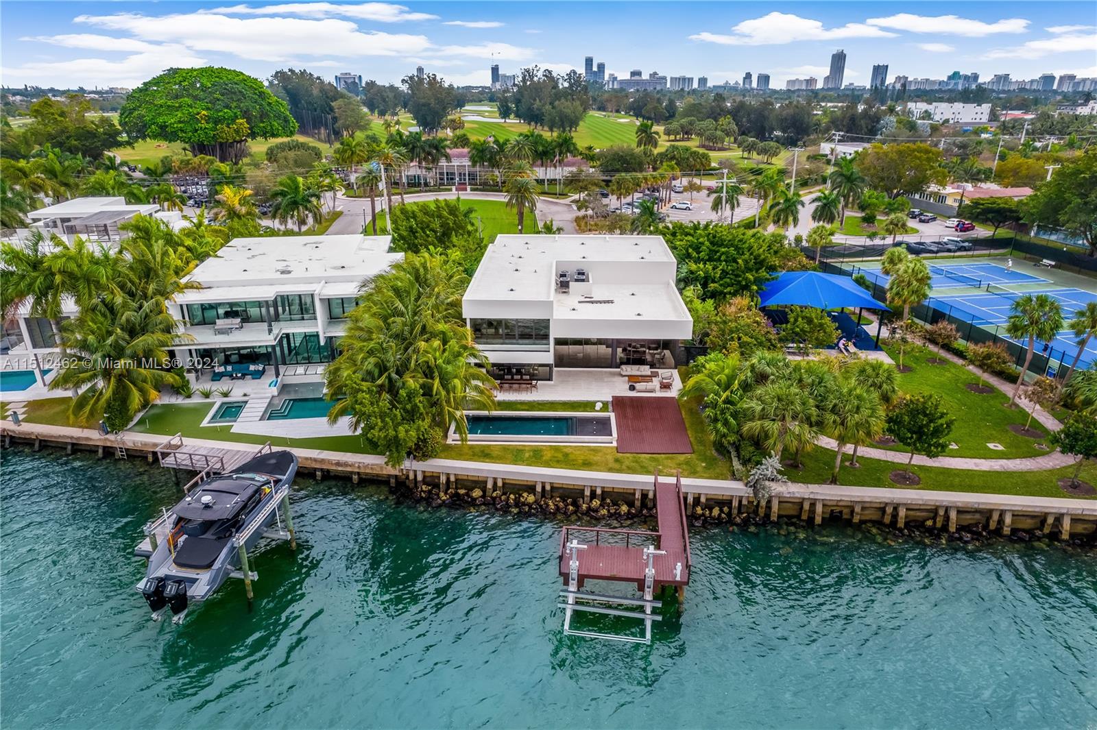 Normandy Shores Miami Beach, FL 33141 - Photo 11 of 47 an aerial view of a house with a garden and lake view