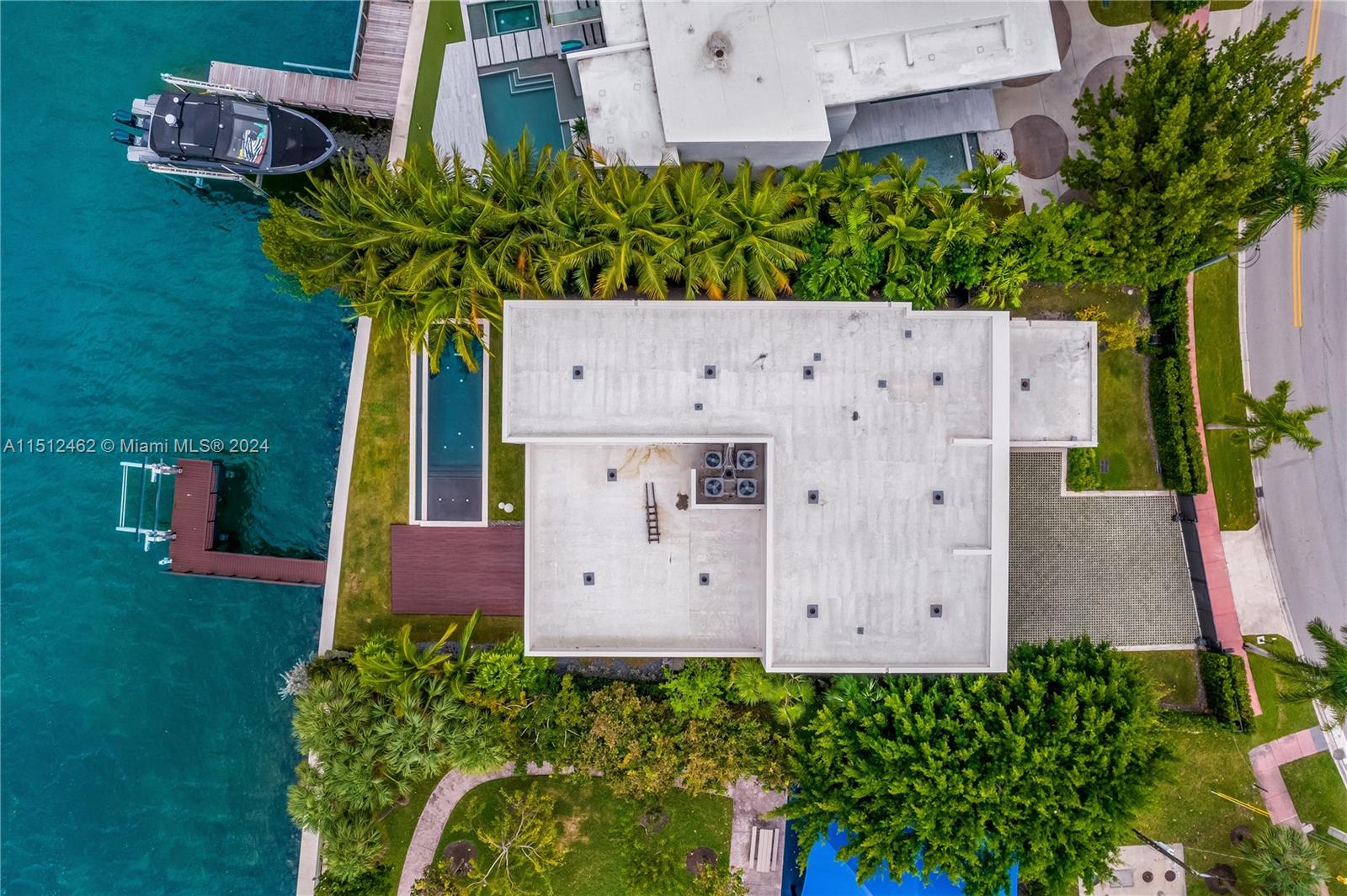 Normandy Shores Miami Beach, FL 33141 - Photo 13 of 47 a view of a house with a wooden fence