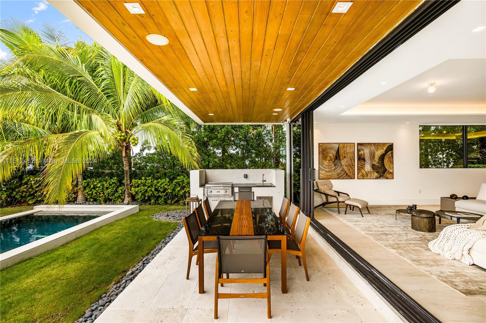 Normandy Shores Miami Beach, FL 33141 - Photo 16 of 47 a view of a patio with a table and chairs