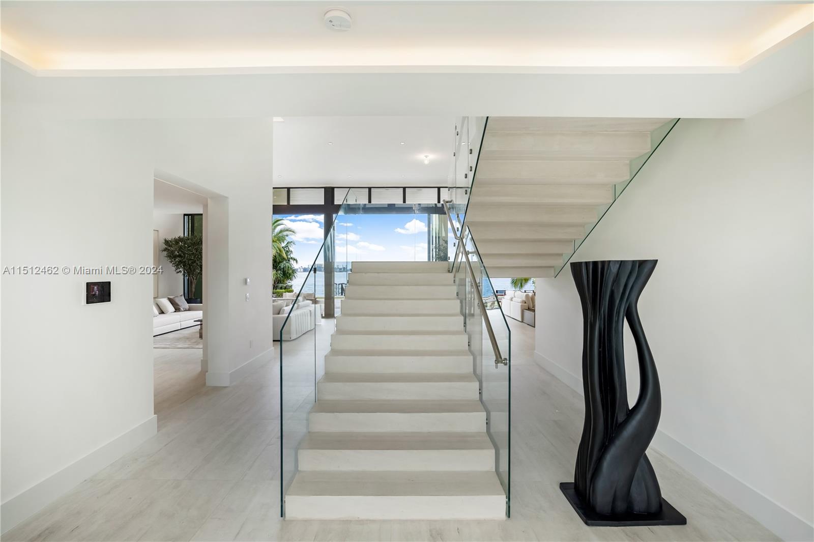 Normandy Shores Miami Beach, FL 33141 - Photo 19 of 47 a view of entryway and hall with wooden floor