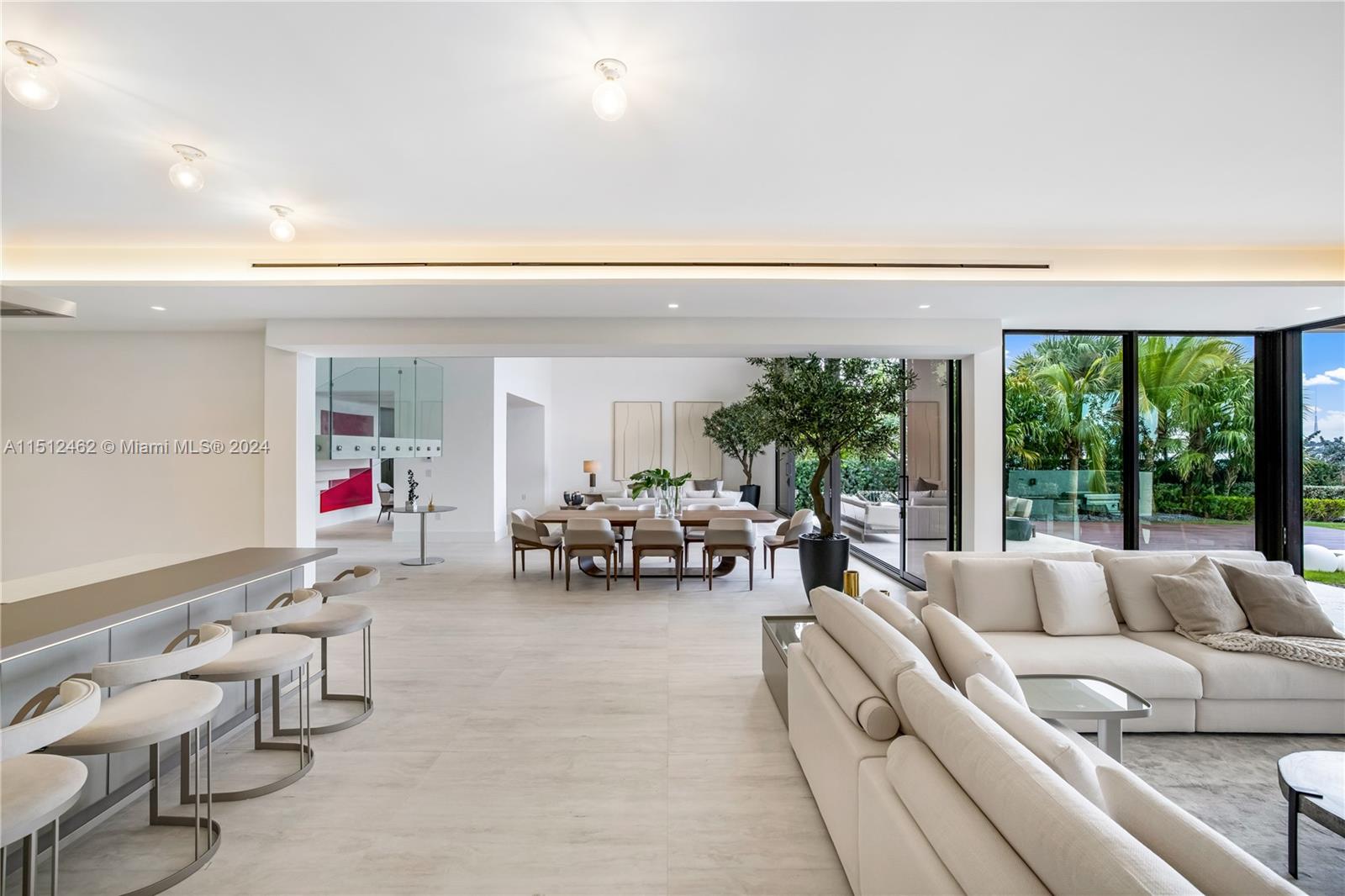 Normandy Shores Miami Beach, FL 33141 - Photo 26 of 47 a living room with furniture and a potted plant