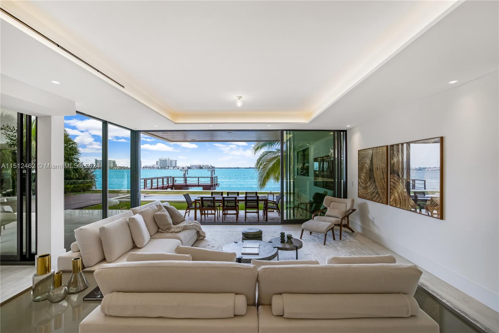 Normandy Shores Miami Beach, FL 33141 - Photo 27 of 47 a living room with furniture and a large window