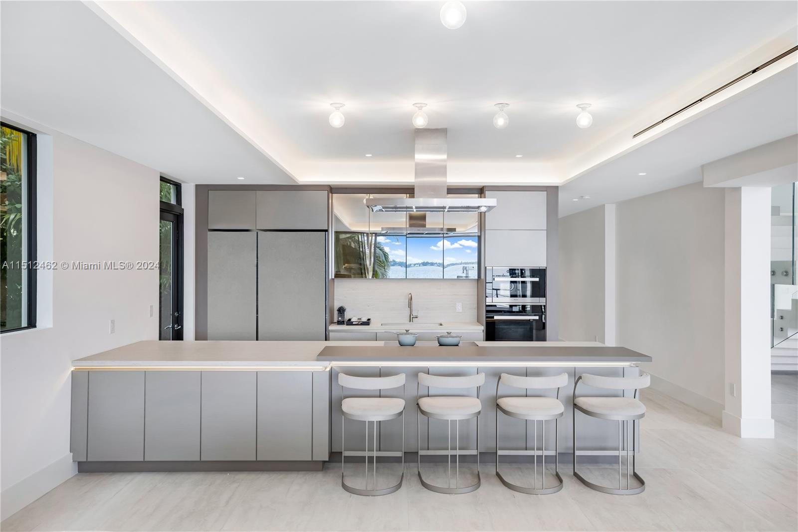 Normandy Shores Miami Beach, FL 33141 - Photo 30 of 47 a kitchen with a sink cabinets and window