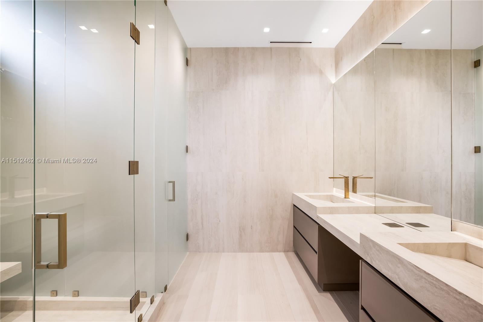 Normandy Shores Miami Beach, FL 33141 - Photo 39 of 47 a bathroom with a sink a toilet and shower